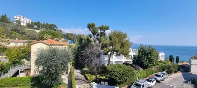 an aerial view of a residential neighbourhood with cars parked at Bright Appartment perfect location in Saint-Jean-Cap-Ferrat