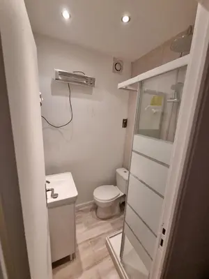 a small bathroom with a toilet and a sink at Appartement Nice Centre Medecin in Nice