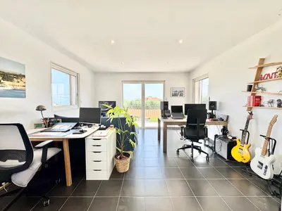 an office with two desks and two guitars in it at Villa SYAGRUS - Easy Home Booking in Nice