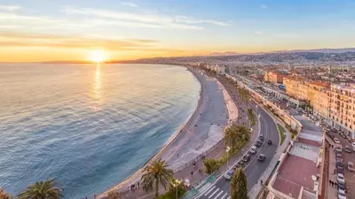 an aerial view of a beach at sunset at Petit cocon en duplex - Centre-ville & plage à 2 minutes in Nice