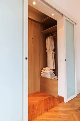 a room with a closet with a bunch of clothes at LE CAP DE NICE VI4150 by RIVIERA HOLIDAY HOMES in Nice