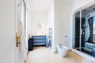 a bathroom with a toilet and a sink at LE CAP DE NICE VI4150 by RIVIERA HOLIDAY HOMES in Nice