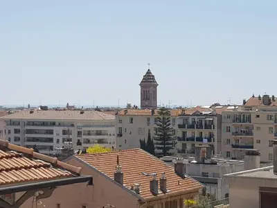a view of a city with a clock tower at Centre de Nice : Studio rénové, climatisé et calme in Nice