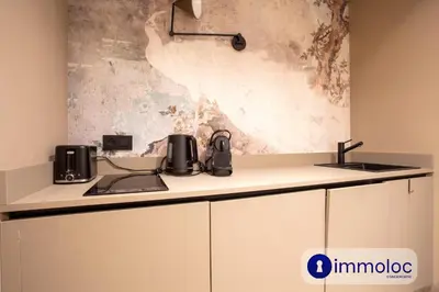 a kitchen with a sink and a counter top at Air-conditioned apartment in Old Nice in Nice