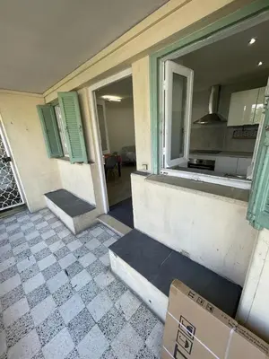 a box is sitting outside of a house at Suite Gloria Five stars holiday house in Nice