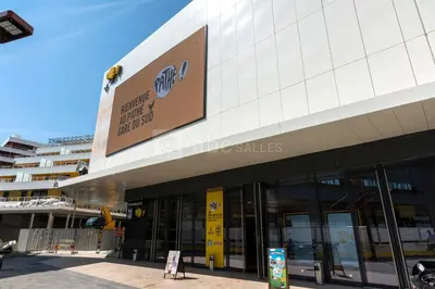 a building with a sign on the side of it at Cosy appartement en plein coeur de la libération in Nice