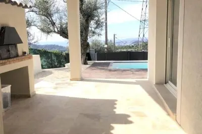 a house with a view of a swimming pool at Nice, Magnifique villa vue mer avec piscine in Nice