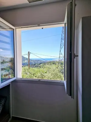 a window in a room with a view at Nice, Magnifique villa vue mer avec piscine in Nice
