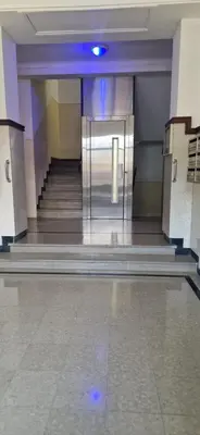 an empty hallway with a elevator in a building at NICE STUDIO 26m2 avec TERRASSE 16m2 in Nice