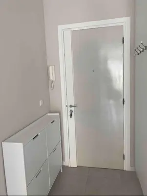 a white room with a door and a white dresser at The entire apartment 2 rooms, Balcony, Sea view in Nice