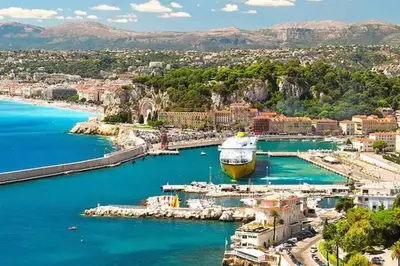 a large boat is docked in a harbor at Studio à louer au cœur du Carré d or à Nice, rue Dalpozzo à 150 mètres des plages in Nice