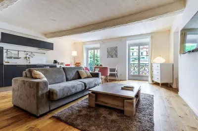 a living room with a couch and a coffee table at Joli loft entre le vieux Nice et le port in Nice