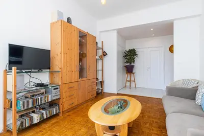 a living room with a couch and a table at The place to be in Nice in Nice