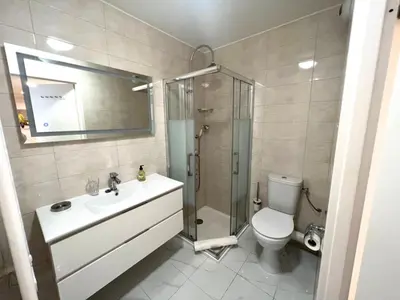 a bathroom with a sink and a shower and a toilet at Sunlight Properties - Mirage - Central Nice with Parking and Terrace in Nice