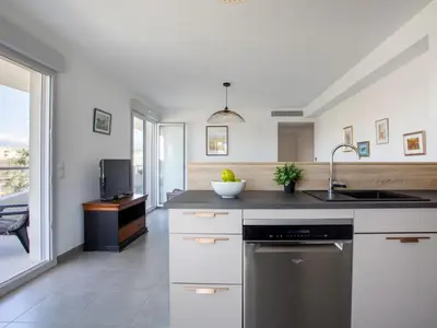 a kitchen with a sink and a dishwasher at Apartment Rive de Cagnes by Interhome in Cagnes-sur-Mer