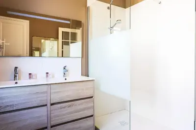 a bathroom with a sink and a shower at Villa Reve d azur vi4353 by Riviera Holiday Homes in Nice