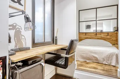 a small bedroom with a desk and a bed at Peaceful Haven, Terrace in Nice in Nice
