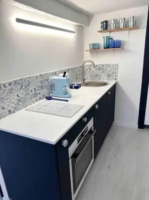 a kitchen with a sink and a counter top at Nouveau - Nice Mamac - centre in Nice