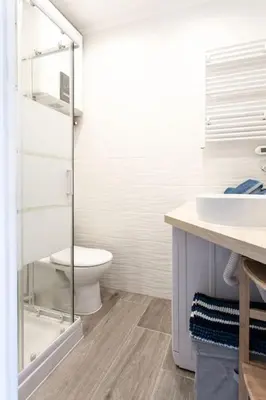 a bathroom with a toilet and a sink at #2 Central Studio top floor AC & Balcony in Nice