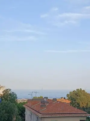 a view of the ocean from the roof of a building at F4 avec vue mer / Flat with sea view 3 bedrooms in Nice