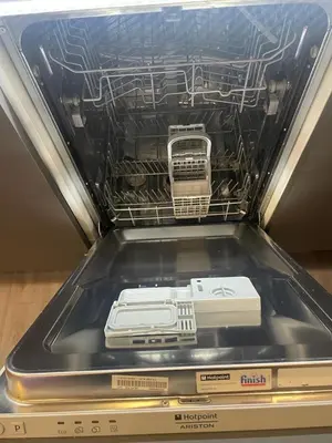 an open dishwasher with an appliance inside of it at Magnifique studio carré d’or in Nice