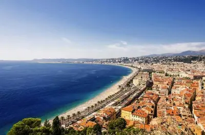 an aerial view of a city and the ocean at Vue mer et montagne panoramique in Nice