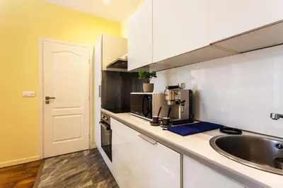 a kitchen with a sink and a counter top at LE ST FRANCOIS AP4368 By Riviera Holiday Homes in Nice