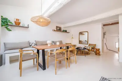 a living room with a table and chairs and a couch at Nice Renting - NEUVE - Luxury Triplex Old Town Massena Garibaldi - 4 BedRoom - AC in Nice