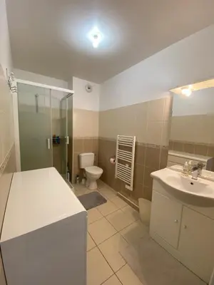 a bathroom with a sink and a toilet at Studio cosy in Nice