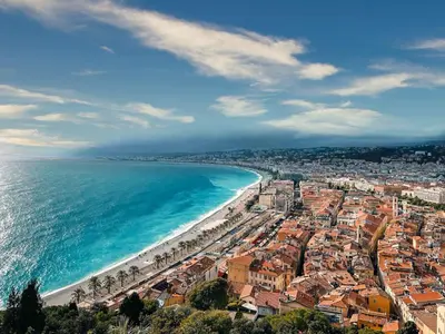 an aerial view of a beach and the ocean at Studio cosy in Nice