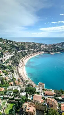 an aerial view of a beach and the ocean at Giant Terrace on a stunning View in Villefranche-sur-Mer