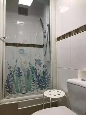 a bathroom with a shower and a toilet at Summer Beach Studio, 4 persons, mobile AC, Old Town in Nice