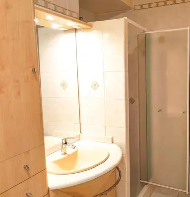 a bathroom with a sink and a shower at Horizon in Saint-Laurent-du-Var
