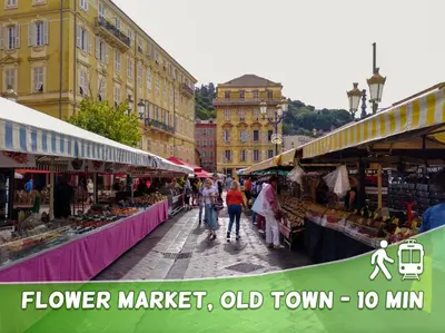 a group of people walking through an outdoor market at Cozy T2 - Lovely Balcony - Center - Liberation - Clim - WIFI in Nice