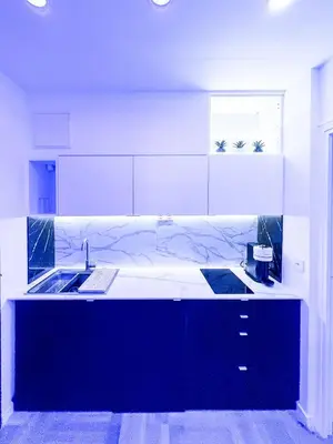 a kitchen with a sink and a counter top at Promenade-des-anglais-front-sea in Nice