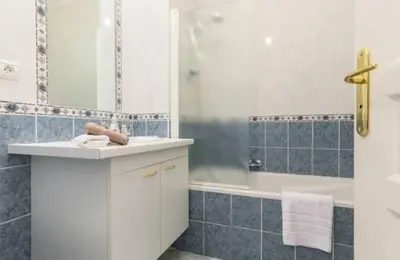 a bathroom with a sink and a shower and a tub at St JEAN CAP FERRAT CENTRAL CONTEMPORARY LOVELY WIFI in Saint-Jean-Cap-Ferrat