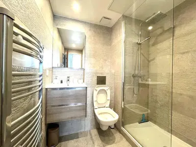 a bathroom with a toilet and a sink and a shower at Hypercentre lamartine 404 in Nice