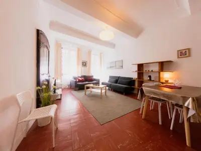 a living room with a couch and a table at Old Town- 4 Pers, Vieux Nice, AC, wifi in Nice