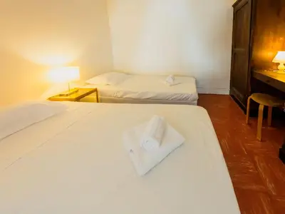 a room with two beds with white towels on them at Old Town- 4 Pers, Vieux Nice, AC, wifi in Nice