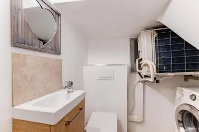 a bedroom with a bed and a window at Vieille Ville - 5 pers, AC, WIFI in Nice