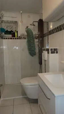 a bathroom with a shower and a toilet and a sink at BEACH APPART in Nice