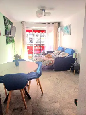 a bedroom with a bed and a window at Charmant F1 proche du tramway et plages in Nice