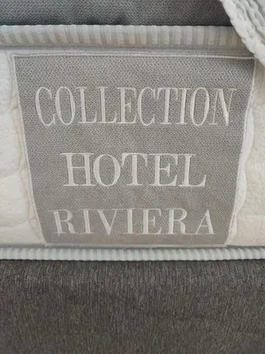 a sign that reads collection hotel riviera at Boutique Studio 1 in Nice