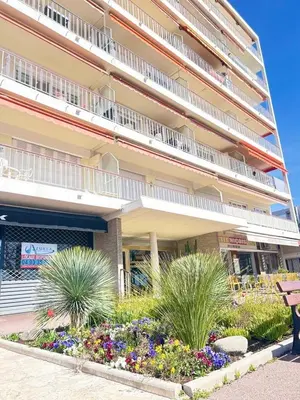 a bedroom with a bed and a window and a bed sidx sidx sidx at Cros de Cagnes, apartment with the Best Location in Cagnes-sur-Mer