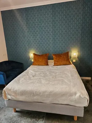 a bedroom with a bed with two pillows on it at Boutique Studio 2 in Nice