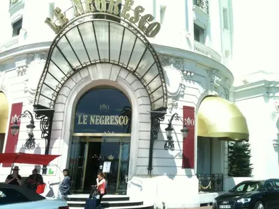 a store front of a building with a sign on it at L'Azur Promenade in Nice