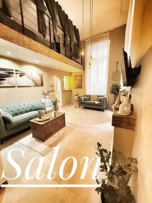 a large living room with a blue couch at Spacious Loft, Duplex, Old Town, 3 bedrooms - EASY CHECK-IN in Nice