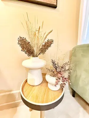 two vases on a table with flowers on it at Spacious Loft, Duplex, Old Town, 3 bedrooms - EASY CHECK-IN in Nice
