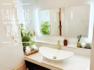 a white bathroom with a sink and a mirror at Spacious Loft, Duplex, Old Town, 3 bedrooms - EASY CHECK-IN in Nice
