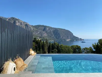 a swimming pool with a view of the ocean at Luxury Villa with Pool & Sea View-10 Minutes from Monaco in Èze